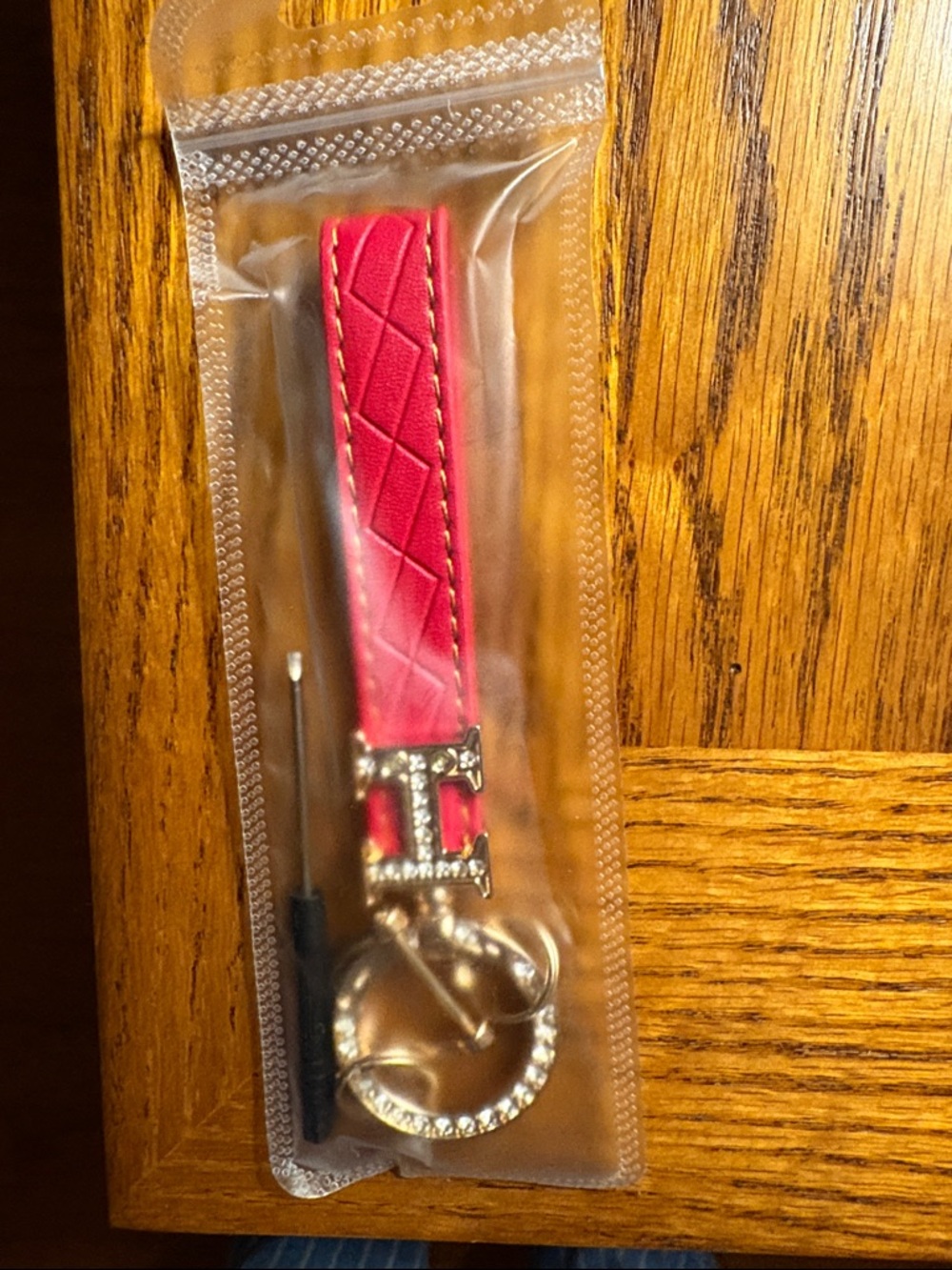 Red Vegan Leather Keychain with Gold Tone Crystal Accents - Picture 3 of 3